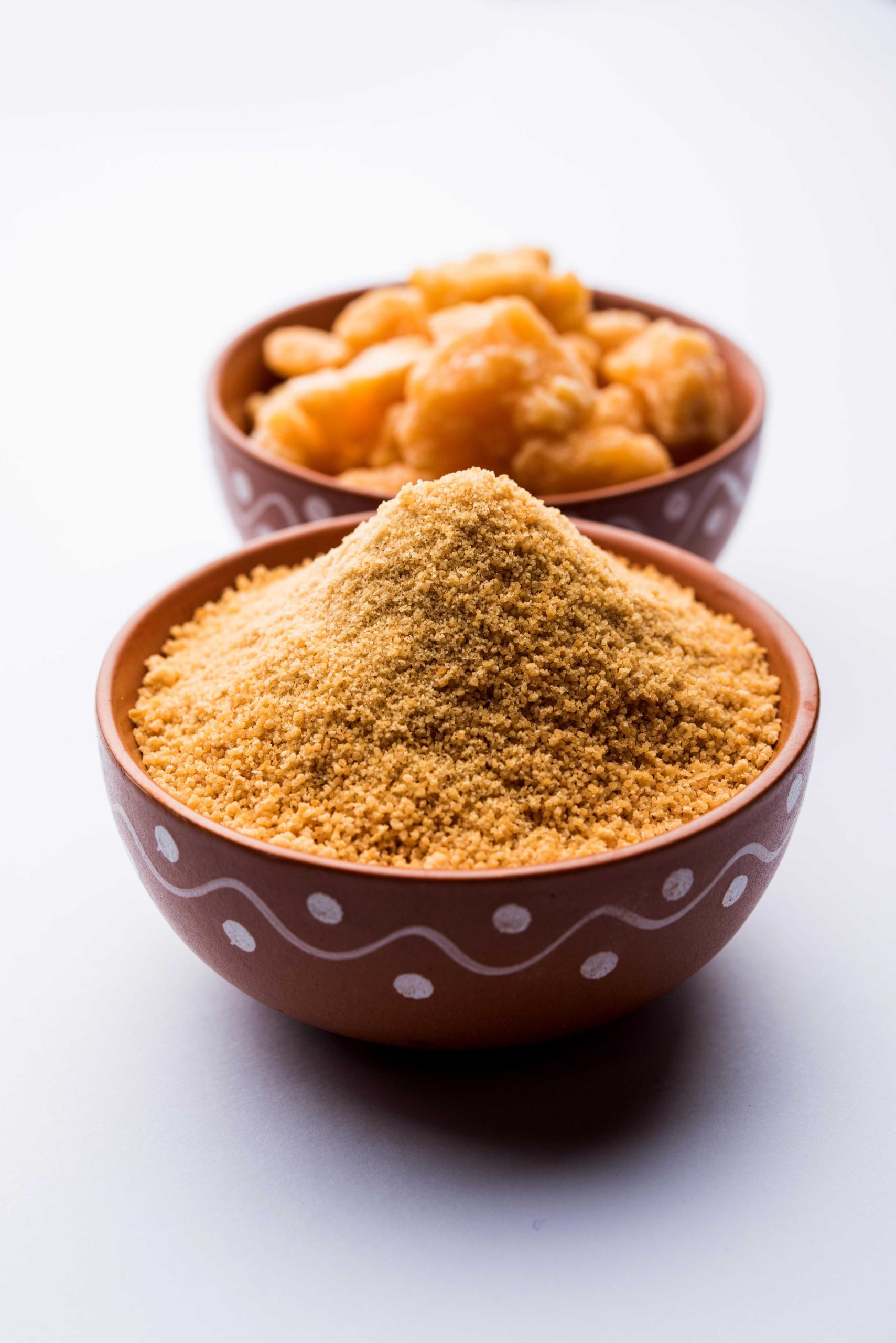 organic-gur-jaggery-powder-is-unrefined-sugar-obtained-from-concentrated-sugarcane-juice-served-bowl-selective-focus_(1)-transformed